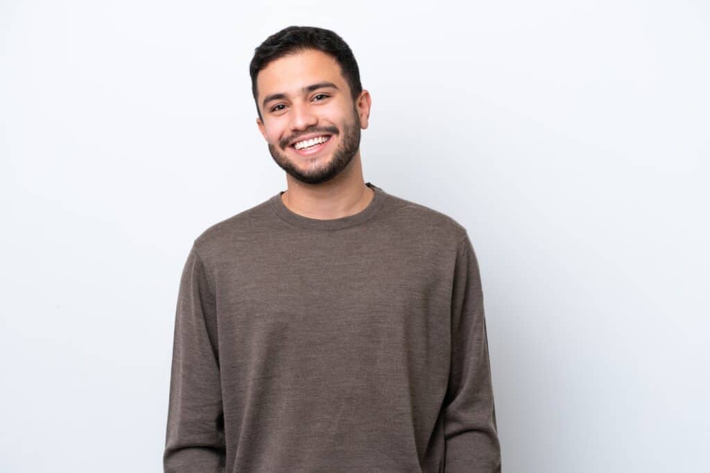 Young,Brazilian,Man,Isolated,On,White,Background,Laughing