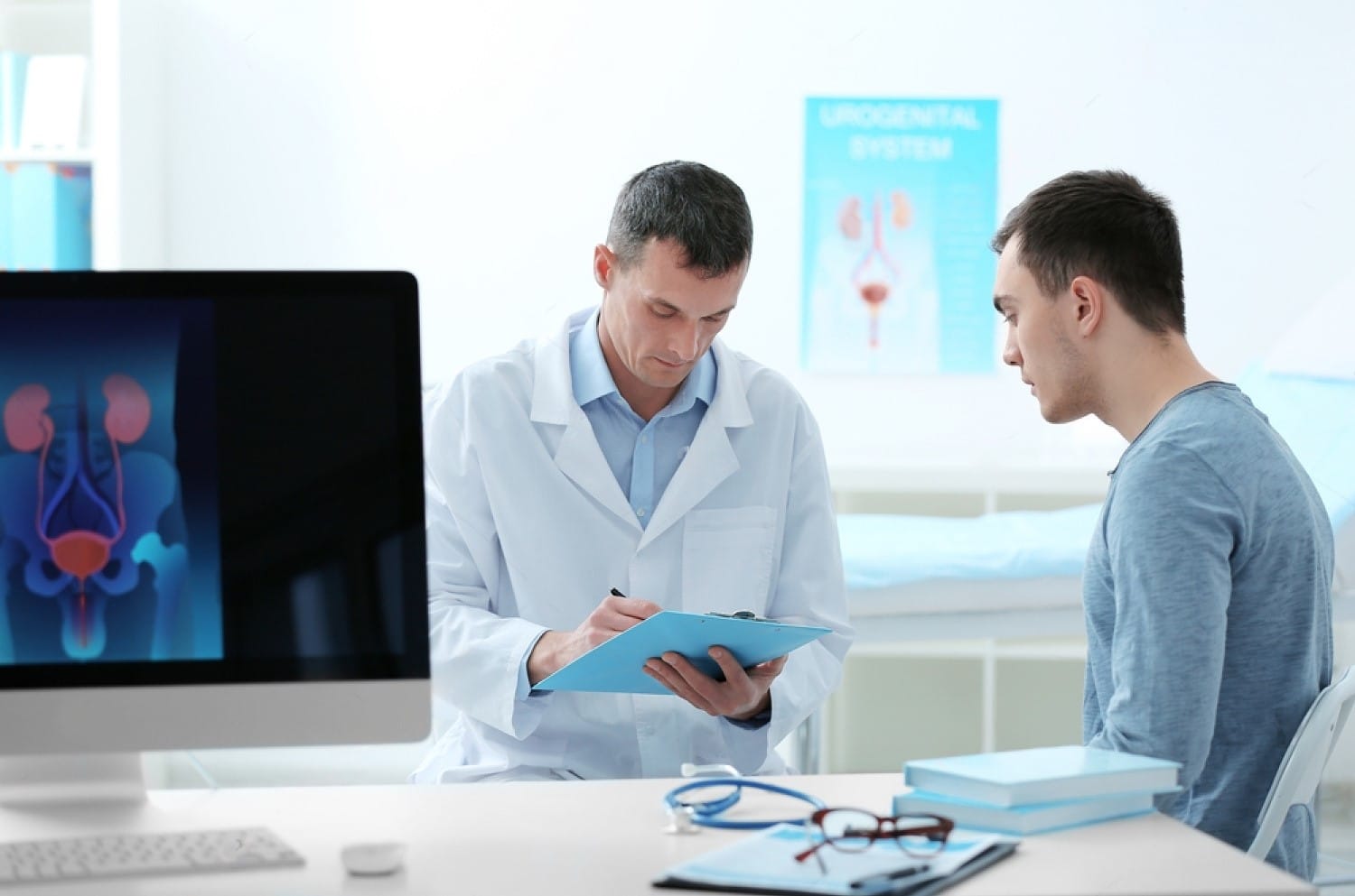 Man meeting with urologist to discuss sexual health at Atlas Men’s Clinic